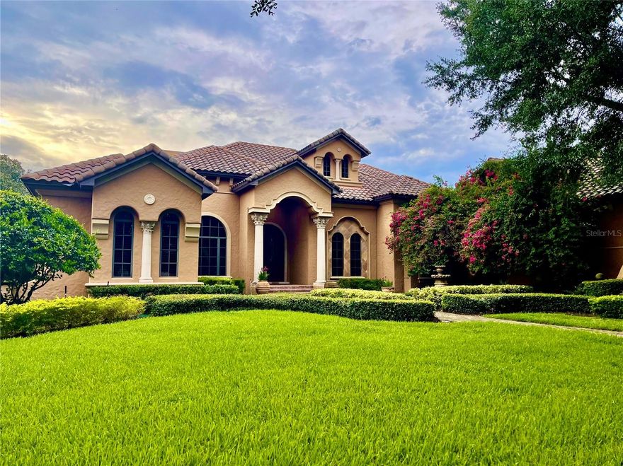 Custom-Built Golf Estate in Keene's Pointe, one of Windermere's most sought-after communities. This home greets you with lush landscaping, paver walkways, and a custom-built wood and iron double front door.  Featuring a formal living and dining room with wet bar and wine cellar, private office, and primary suite with a spacious bath including dual sinks, rain shower and custom lighting and access to the large walk-in  closet. The private executive office has beautifully crafted woodworking in the ceiling and walls and custom built-in desk and library. All secondary bedrooms feature walk-in closets and their own en-suite bathroom. The kitchen offers a commercial grade range, double dishwasher, trash compactor and walk-in pantry, all of this opens up to the breakfast nook, family room and overlooks the oversized lanai, pool/spa and golf course. The game room features a full-service bar with refreshment cooler and Ice Maker.  The oversized patio boasts plenty of covered area to create your own oasis and is complete with its own gas fireplace and full summer kitchen. A spacious laundry and 3-car garage complete this home.