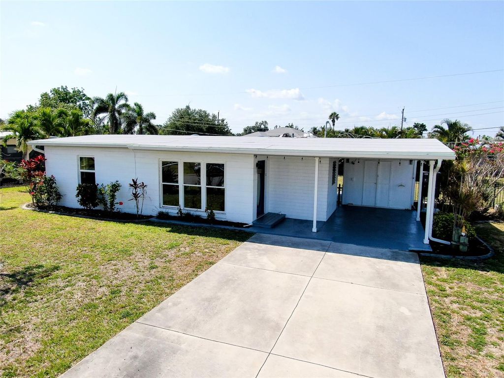 Photo of 140 Poinsettia Circle NE, Port Charlotte, FL 33952 (MLS # N6138860)