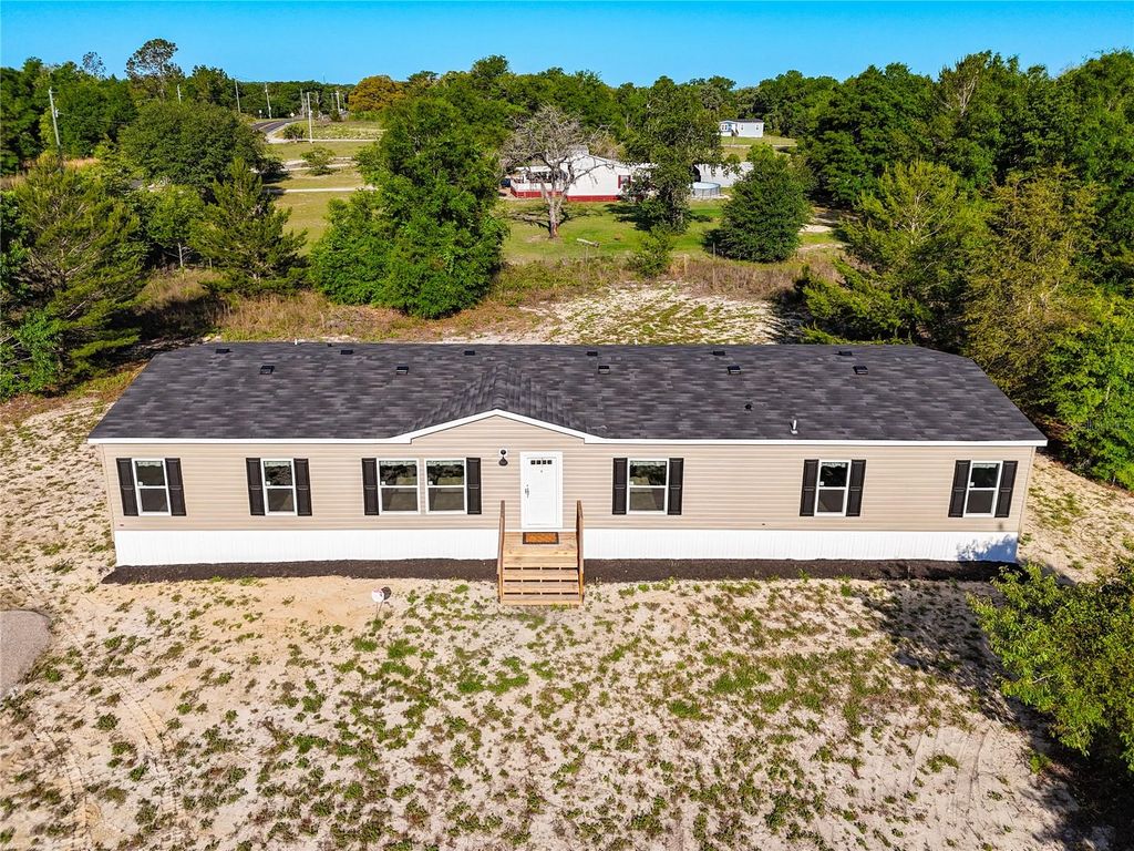 Photo of 101 Orange Tree Street, Pomona Park, FL 32181 (MLS # V4948592)