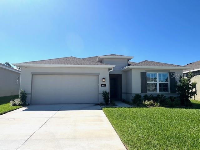 An inspiring home, in the ever-popular residential community of Park Meadows. This well-maintained home has what everyone is looking for, offering three bedrooms, two baths, a two-car garage and a lanai with a serene pond view and no rear neighbor. There’s a lot to love about this home, a 2023 built open concept home, with soft decorator and added features, such as plantation shutters, stylish ceramic tile floors, and oversize baseboards. Then the joy to everyone is the beautiful gourmet kitchen, featuring the hard surface countertops with a deep stainless sink, stainless appliances, glass top range and beautiful white, soft close Shaker cabinetry and a large pantry. The large center island provides a breakfast bar and will be the gathering place when you are entertaining your guest. You will enjoy the back lanai with the peaceful pond view, while you're grilling out and watching your family play, relax and entertain. The primary retreat also shares the serenity pond view. Its bath features a large walk-in shower, his and her separate vanities with hard surface countertops, and an oversize walk-in closet that includes a custom closet system. This home is a two-way split plan, giving privacy to the main suite on the opposite side of the home, you will find two bedrooms and a bath on the other side. This home is great for entertaining family and friends, enjoying great weekends, spending the day at the community pool with two covered cabanas, or spending your day at the Wesley Chapel District Park, with lots of great activities. Park Meadows is ideally situated just across the street from Cypress Creek Middle School, Cypress Creek High School (A-rated), and Pasco-Hernando State College. You’ll be able to enjoy the top shopping or dining out at the Krate at the Grove, Tampa Premium Outlets, and The Shops at Wiregrass. A new Target store at The Grove is set to open soon, adding even more convenience to this growing area. Conveniently located just off the new Overpass exit near I-75 and close to the Lagoon community.