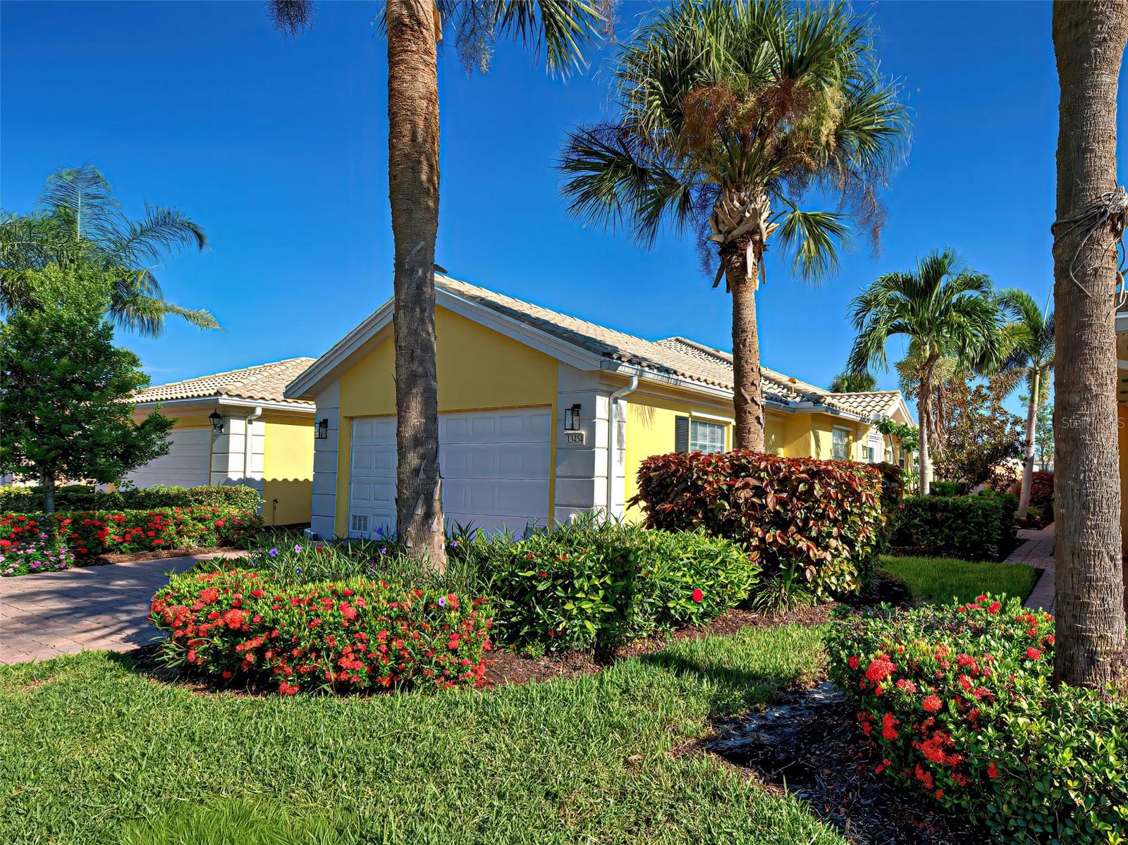 Move right in to this turnkey Divosta built 2-bedroom, 2-bath villa with tile thruout, located in the gated community of Islandwalk with its unique lakes and Venetian-style bridges. This solidly constructed home features an open floor plan, spacious living areas, and ample natural light throughout. Enjoy the Florida lifestyle with your own private pool, perfect for relaxing or entertaining. With quality craftsmanship, this original DiVosta poured concrete constructed home has a well-designed layout that offers both comfort and durability. With 2 spacious master bedroom suites, it ensures privacy for both you and your guests. Lifestyle is the key word here! Islandwalk offers two clubhouses with resort-style and lap pools, spas, fitness centers, 12 lighted pickleball courts, 8 Har-Tru tennis courts, bocce ball, a dog park, fire pits, and grilling area, and also larger concrete paths for your golf cart. Beyond the gates, you’re just minutes away from Manasota and Venice Beach, Downtown Venice restaurants, charming shops and theater,  Enjoy Resort-style living close to beaches, shopping, and restaurants!  Just outside the side gate, enjoy the excitement of the Atlanta Braves' spring training at Cool Today Park and the Wellen Park community with shopping, dining, and events. IslandWalk is one of VENICE'S most social communities with a FULL TIME ACTIVITIES DIRECTOR, countless events and clubs and activities.
 Whether you're looking for a full-time residence or a seasonal retreat, this is the perfect place to call your home in paradise! HOA includes internet and cable.