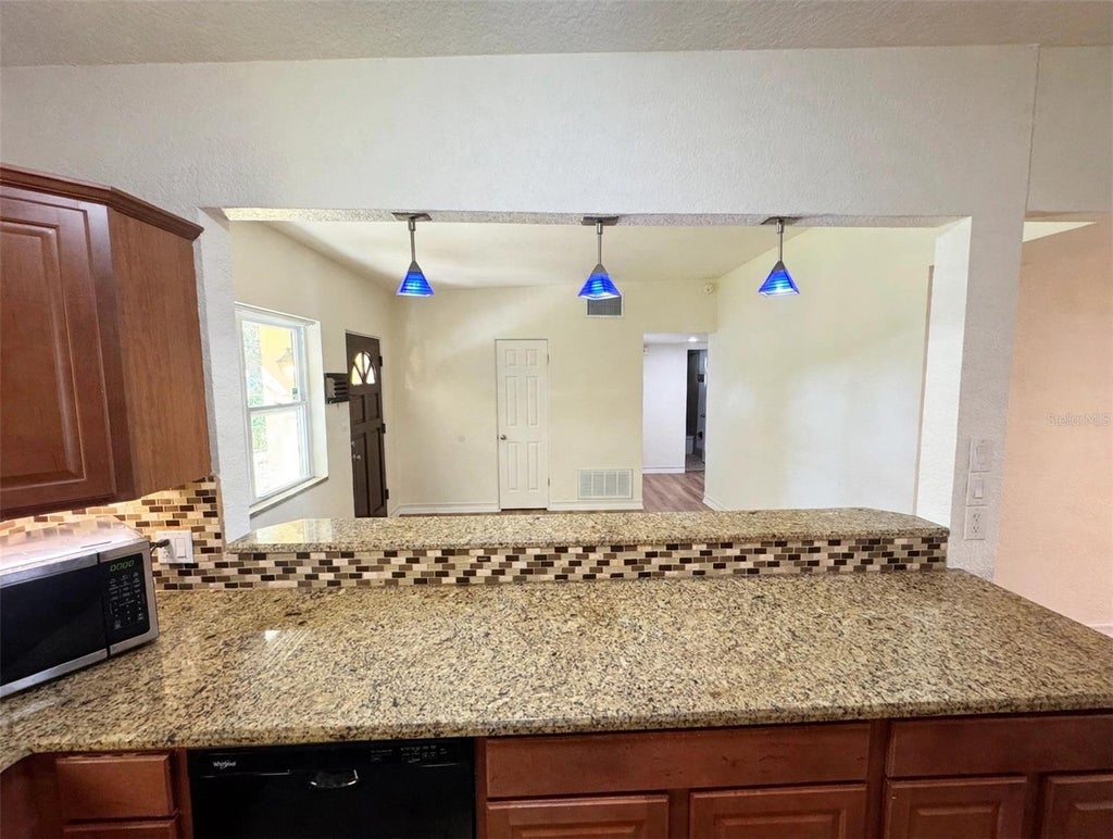 Photo of 3015 Illingworth Avenue, Orlando, FL 32806 (MLS # O6452151)