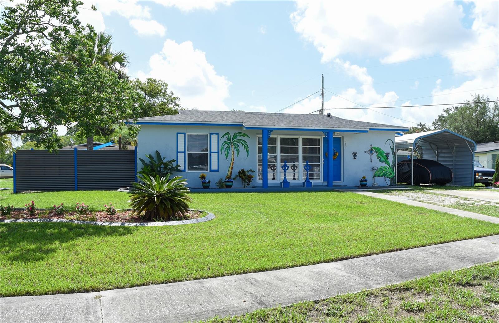 Welcome to this unique 2 bedroom, one bath gem, where artistry meets comfort! Nestled on a corner lot of .24 acres in a tranquil neighborhood, this home is designed for easy low maintenance living. The property has been lovingly maintained with a new roof in 2021, brand new AC, new Electric Water heater and pool pump as of 2025. Enjoy privacy in the fenced in backyard, perfect for pets, and a spacious shed with a workshop with electricity. Natural light floods every room, with the living room showcasing three panel floor to ceiling windows. The bonus room offers access to an oversized pool and a large deck, ideal for entertaining. The kitchen is equipped with appliances and plenty of cabinetry and stylish backsplash. Conveniently located just minutes from shopping, various dining options, schools and healthcare facilities, and only minutes from I-4 for easy access to Orlando or east to Daytona Beach. Book your showing today.