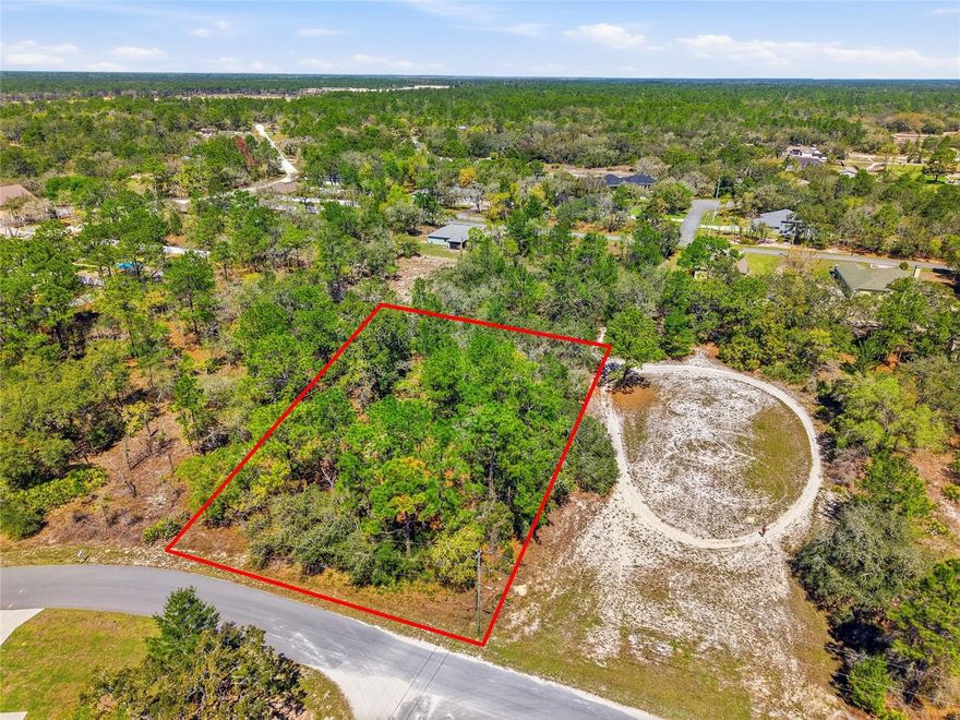 Build your Florida dream home on this expansive 0.74-acre homesite located in the sought-after Royal Highlands community of Hernando County. Tucked away on a quiet street and surrounded by custom homes and serene woodlands, this R1C-zoned (Single Family Residential) property offers the ideal combination of privacy, space, and convenience—with no HOA or CDD fees.
Situated in a high-and-dry area with nearby power access, this lot is well-suited for a standard well and septic system, making it an excellent canvas for your custom build. Enjoy a peaceful, natural setting while still being just minutes from US-19 and the Suncoast Parkway, providing easy access to shopping, dining, medical facilities, and the stunning Gulf Coast beaches. Zoned for Winding Waters K-8 and Weeki Wachee High School, and located near HCA Florida Oak Hill Hospital, this property is also perfectly positioned for outdoor enthusiasts—just a short drive to Weeki Wachee Springs State Park, kayaking adventures, and scenic nature trails. Conveniently located approximately one hour north of Tampa and about 20 minutes to the Gulf, this homesite offers the perfect opportunity to create your own private retreat while staying connected to everything the Nature Coast has to offer.