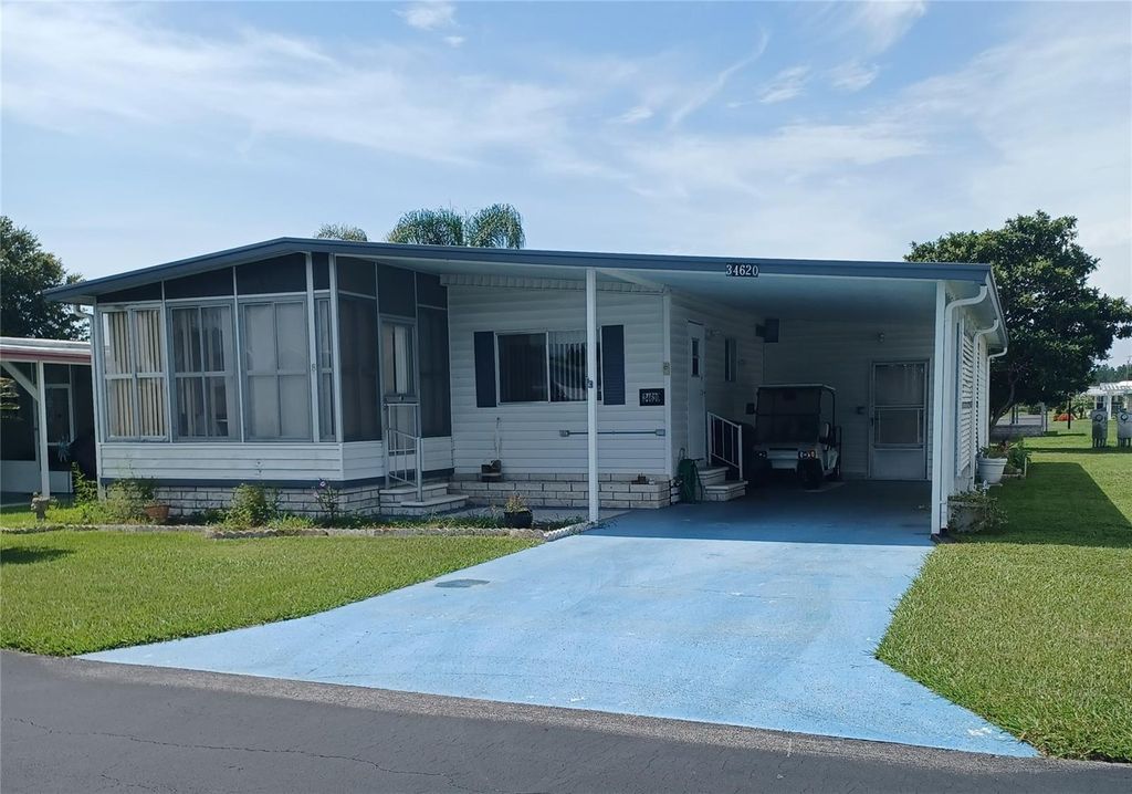 Photo of 34620 Sweetpea Lane, Zephyrhills, FL 33541 (MLS # TB8407092)
