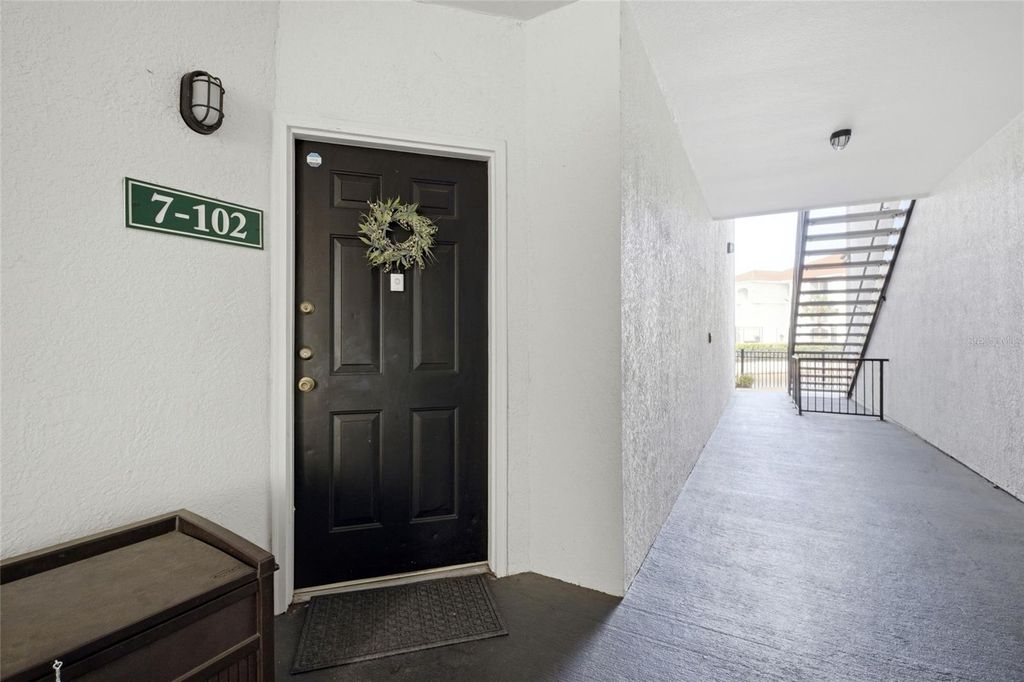 Photo of 2639 Maitland Crossing Way #102, Orlando, FL 32810 (MLS # S5146232)