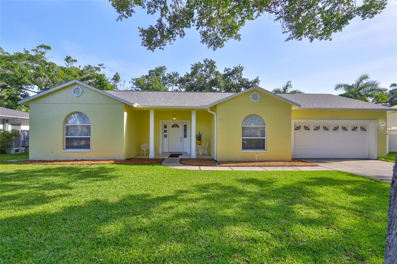 Have you ever dreamt of waking up to the warm Florida sunshine and the soft, white sands of the Gulf Coast?
This beautifully updated 3-bedroom, 2-bath split-plan home is located just over 5 miles from iconic Pier 60, where you’ll enjoy world-class shopping, dining, nightlife, and the breathtaking shores of Clearwater Beach.
Step inside to discover a thoughtfully upgraded interior, featuring a newer roof, updated water heater, modern appliances, stylish flooring, a newer A/C system, two convenient rear entry doors, freshly painted interior and a genuine wood-burning fireplace for cozy evenings.
The master en-suite is a true retreat, offering a spacious walk-in closet, private water closet, double vanity, separate walk-in shower, and a luxurious jacuzzi tub for the ultimate in relaxation. Step through the sliding glass doors from the master bedroom into your backyard oasis.
The kitchen steals the spotlight with a stunning island, ample cabinet space, and charming Bahama shutters that frame your backyard view with both elegance and privacy. Whether you’re hosting or preparing a quiet meal, this space is designed to impress.
The vinyl privacy fence surrounding the backyard creates the perfect space for entertaining, with plenty of room for children and pets to roam freely. Considering a pool or hot tub? The yard is ready for your dream outdoor space — the possibilities are endless!
Enjoy large gatherings in the separate formal dining area or opt for casual meals in the sunny eat-in kitchen.
Schools, shopping, and medical facilities nearby.
Don’t miss your chance to call this Florida gem home. Schedule your private showing today — paradise awaits!