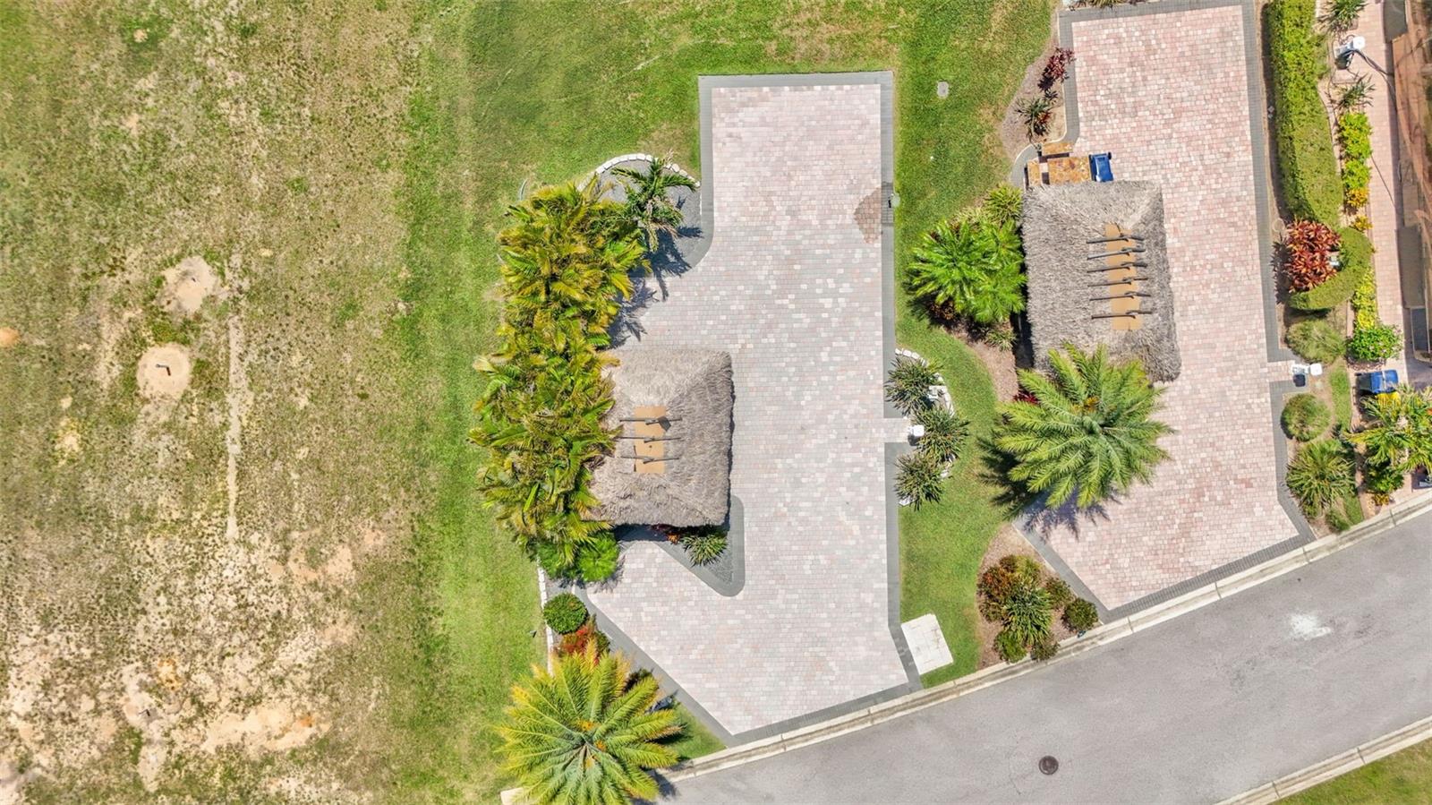 With mature landscaping, this paver pad and screened Tiki Hut has well established privacy and is ready to go, just waiting for you to make it your personal paradise!
The paver pad next door can be purchased as well, and also has a Tiki Hut. If you are looking for a double lot, check out the adjacent property to the south:
2864 Wood Duck Dr. Polk City, FL 33868
This property is priced to sell!
Bay Lake Motorcoach Resort is a Class A motorcoach resort offering incredible amenities. Owners and visitors can fill their days with activities and club outings or simply relax and enjoy the resort. Whether in search of community, travel, relaxation or recreation, Bay Lake is your home base for the Florida Lifestyle.