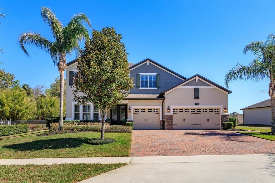 This exceptional 4-bedroom, 3½-bath home sits on an oversized premium cul-de-sac lot with no rear neighbors and no neighbors to the left offering rare privacy. A 3-car garage provides ample room for vehicles and storage.
Step through the grand double-door entry into a large, elegant foyer that sets the tone for the rest of the home. Featuring 9-foot ceilings, crown molding, recess lighting and upgraded 8-foot doors throughout, the open-concept layout creates an inviting atmosphere perfect for both everyday living and entertaining.
The gourmet kitchen is a true centerpiece, complete with stainless steel appliances, quartz countertops, copper sink, upgraded cabinetry with soft-touch drawers, and an expansive island that seamlessly flows into the kitchen nook also overlooking the living room, elegant dining room with upgraded tray ceiling, all giving stunning views of the paved, covered lanai and your screened-in saltwater pool, your own private outdoor retreat.
Conveniently located on the main floor, the spacious master suite with custom tray ceiling, an en suite that offers peaceful escape with double vanities, quartz countertops, a soaking tub, walk-in shower, and generous his-and-hers walk-in closets.
Also on the main level, you’ll find a half bath, a private office with custom built-ins, a large inside laundry room with additional custom storage, and a thoughtfully designed custom mud area. 
Upstairs features a full guest bathroom, 3 additional oversized bedrooms, one of which also provides a private full bathroom, a large bonus/flex room ideal for a media room, playroom, or gym, plus additional separate space that can serve as extra storage or a small office. The upgraded staircase and banister also add an elegant architectural touch. This home is further enhanced with a whole-home water filtration system. A solar energy system that will be paid in full by the seller at closing, no lease, no assumption, and no additional cost to the buyer. 
All located in a highly desirable community with top tier A-rated schools, close to shopping, dining, and everyday conveniences.