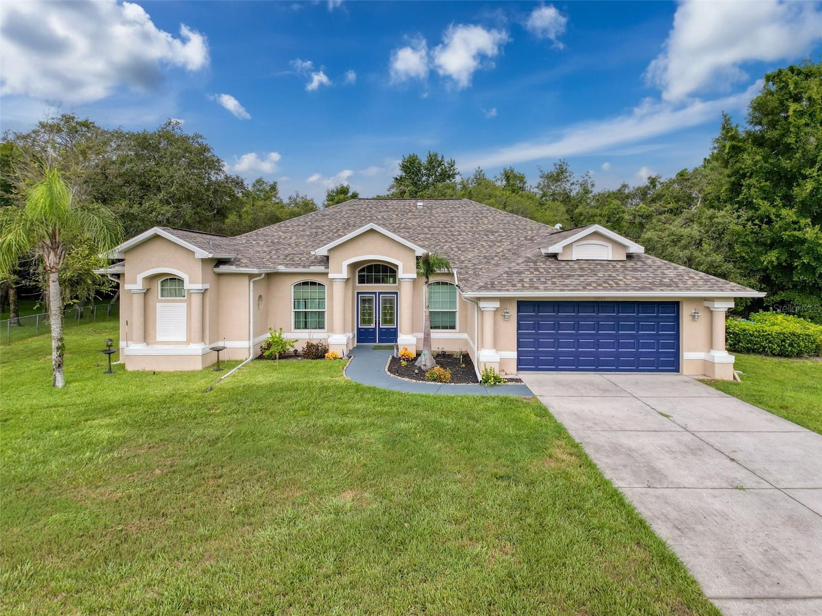 This charming 3-bedroom, 2-bathroom home with an additional office that can easily serve as a 4th bedroom is situated on a spacious lot of over half an acre in a quiet cul-de-sac. Featuring a newer roof and a resurfaced pool, the home is move-in ready and offers a perfect balance of comfort, style, and convenience. The open floor plan fills the interior with natural light, creating a bright and airy atmosphere ideal for both family living and entertaining. Step outside to your own private backyard oasis, complete with a sparkling pool that's perfect for relaxing or hosting guests. A 2-car garage provides ample space for parking and storage. Ideally located, the home is just minutes from hospitals, medical facilities, dining options, and offers quick access to the interstate for an easy commute to Tampa. This property combines peaceful suburban living with proximity to everything you need—schedule a showing today and make this house your home!