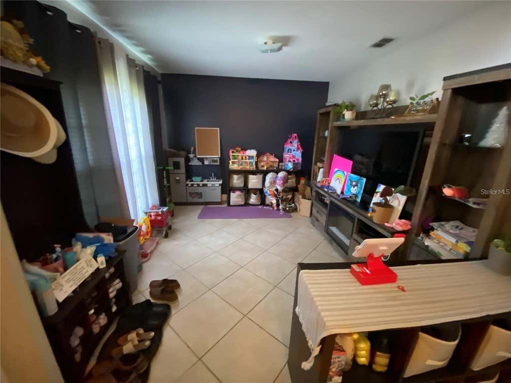 Photo of 1953 The Oaks Boulevard, Kissimmee, FL 34746 (MLS # R4911760)