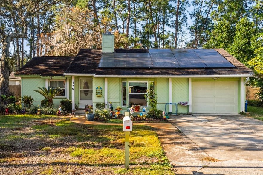 This home is truly a hidden gem, offering the ideal blend of comfort, style, and outdoor living on a rare oversized lot of more than ½ acre in Sanford. Step inside to an inviting open floor plan with show-stopping views of the backyard oasis. Thoughtfully remodeled, the home features a charming bay window with window seat, wood-burning fireplace, and an updated kitchen with granite countertops, newer appliances, and generous workspace. Additional enhancements include updated flooring and a barn-door entry to the primary suite.

You can enjoy the Florida lifestyle year-round in the oversized screened lanai, perfect for morning coffee or evening relaxation. The expansive paver patio provides even more room for outdoor dining, entertaining, or simply taking in the peaceful surroundings. The private backyard retreat is the highlight of the property, offering mature landscaping and stunning sunset views that create a tranquil and inviting setting.

This property offers a rare combination of privacy, charm, and outdoor space—an exceptional opportunity for those seeking a serene and beautifully maintained home. **FRONT YARD BEING RESODDED THIS MONTH!!**