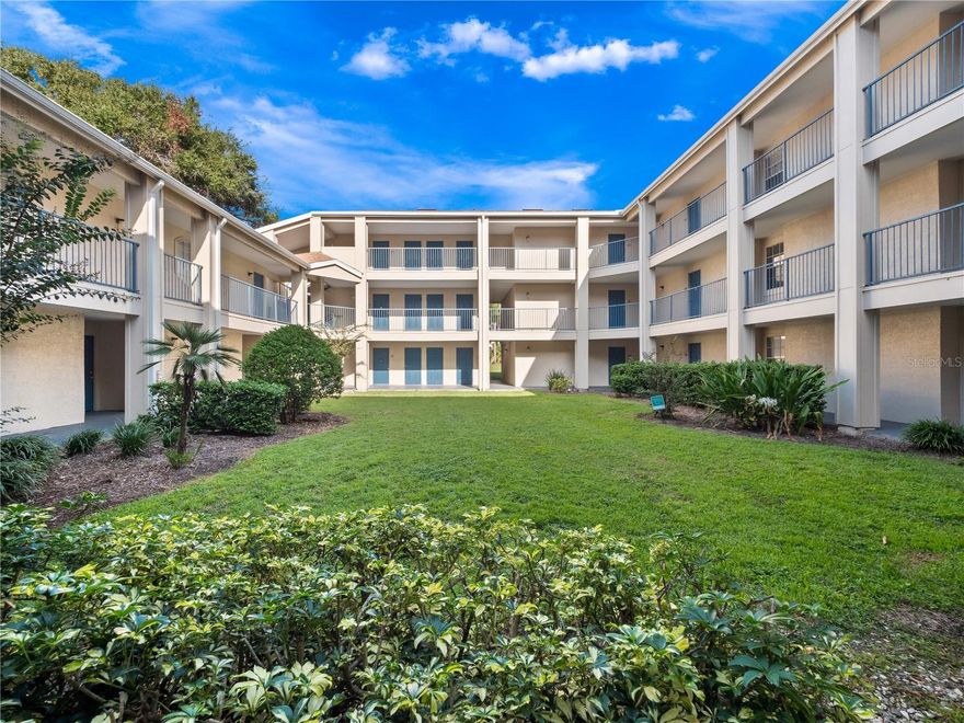 Enjoy tranquil pond views from this light-filled 1-bedroom, 1-bath condo with a private balcony overlooking the water. The spacious living room features built-in shelving, while the bedroom includes a convenient separate vanity area connected to the ensuite bath. All appliances are included for easy move-in. This gated community offers resort-style amenities including a clubhouse, pool, park, dog park, and more—perfect for year-round living or a low-maintenance retreat!