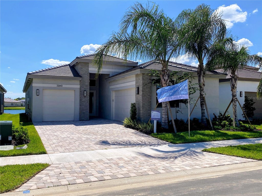 Photo of 32643 Neroli Street, Wesley Chapel, FL 33543 (MLS # TB8454087)