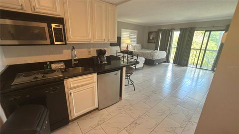 Photo of 6165 Carrier Drive #1215, Orlando, FL 32819 (MLS # O6403480)