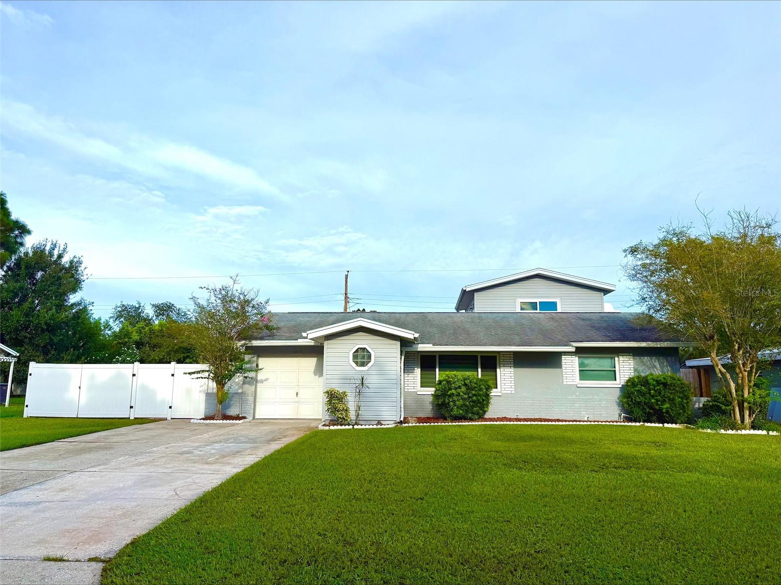 What a fantastic opportunity to own a spacious pool home in desirable Fairview Estates! This high-and-dry residence offers plenty of room to grow with 4 bedrooms and 3 bathrooms, including two ensuite bedrooms conveniently located on the first floor—perfect for in-laws, guests, or a college student seeking a little extra privacy. Inside, you’ll find both a formal living room and a comfortable family room, along with a well-appointed kitchen featuring granite countertops, a breakfast bar, and a dishwasher. Upstairs, a generous 15x17 bonus room provides endless possibilities as a playroom, office, hobby space, or game room. Step outside and enjoy the sparkling pool—an inviting retreat during the warm summer months. The oversized lot is a rare find, offering gated access and plenty of room for your boat, RV, or work trailer. Roof was replaced in 2019 according to the permit. Maybe best of all, the property is located in Flood Zone X, meaning flood insurance is typically not required by lenders. This is a great opportunity to earn some sweat equity on a great home, don’t hesitate and miss this opportunity!