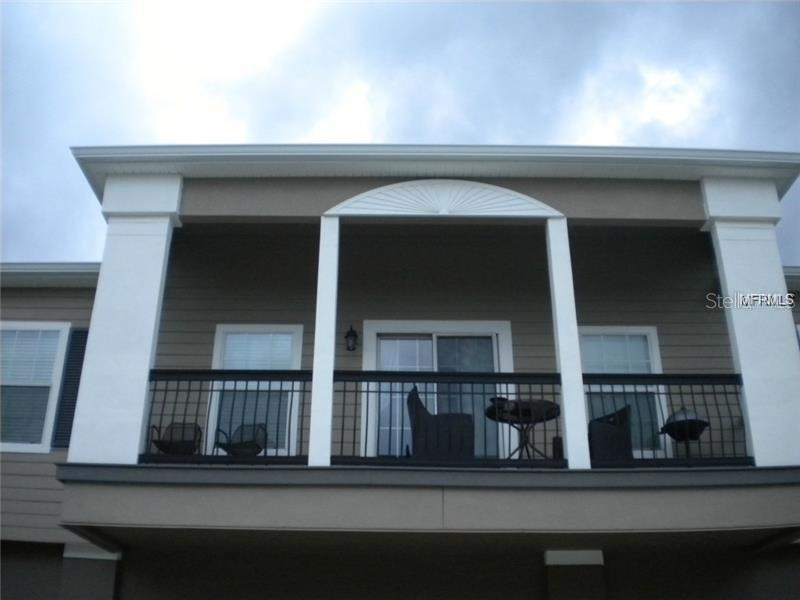 Wonderful 2nd story 2 bed/2bath/1 car attached garage, built in 2009 in gated Carter Glen! This model has a real balcony, where you can relax, have your coffee, and enjoy the scenery. Walk across the street to the lovely pool and clubhouse. It has the open floor plan, with large great room/kitchen, oversized pantry, split bedrooms. Master has large walk in closet, dual vanities, tub and shower.The separate laundry room has an oversized linen closet nearby. Beautiful luxury vinyl plank flooring throughout. No carpet. Painted in soothing neutral colors. Amenities include pool, clubhouse, fitness center, playground, volleyball, scenic trail along the lake. Super easy access to highways 417, 528, 408, a short drive to Orlando International Airport, Lake Nona Medical City, and shopping. ALL "A" rated schools. Fabulous location! Available September 1st.