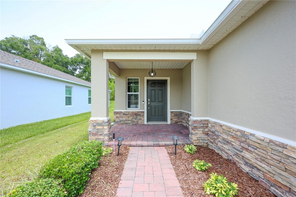 Photo of 1113 Bradford Ridge Drive, Leesburg, FL 34748 (MLS # O6425215)