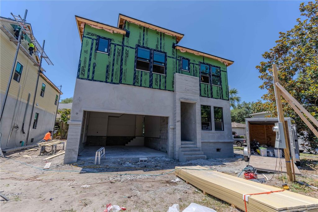 Photo of 4018 W Cleveland Street, Tampa, FL 33611 (MLS # TB8463526)