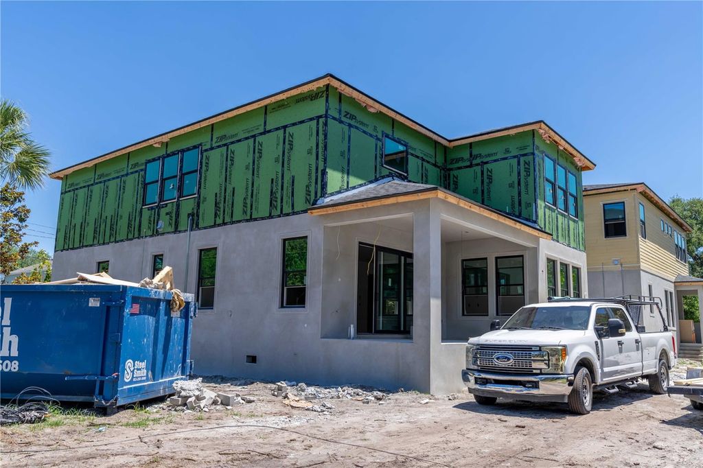 Photo of 4018 W Cleveland Street, Tampa, FL 33611 (MLS # TB8463526)