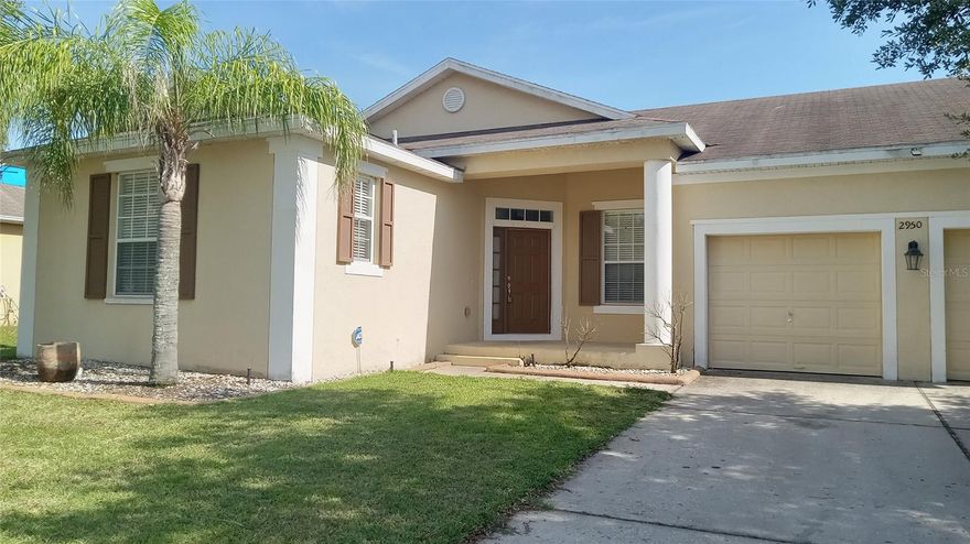 Create beautiful memories in this spectacular home with a captivating water view! Located in a sought after community, this well maintained home is within a short distance to major roads, shopping and Valencia campus. Enjoy your morning walk or have a swim in a sparkling pool.This Community also provide dog park and a playground. Come inside to appreciate this favored split floor plan. The family room is spacious and looks out to the beautiful water view. Enjoy your coffee in a back porch overlooking serene pond surrounded by trees. Functional well maintained kitchen features ample countertop space with 42’’ cabinets, a breakfast bar and stainless steel appliances for a fantastic cooking experience.