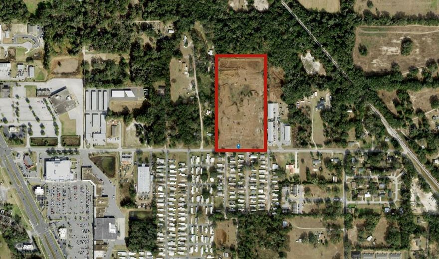 MULTIFAMILY DEVELOPMENT OPPORTUNITY, 15.43 Acres, Zoned B2, In City Limits of Belleview strategically positioned as one of the limited options to help fill the workforce rental supply void of the immediate area.  Offering represents prior 166 Unit Townhouse development with underground & lift station completed in 2005. 15.43 Acres located in City Limits of Belleview between The Villages and Ocala, convenient to new Publix, Schools, Retail & Restaurants.  Although City addition of “Business District” in 2013 changed density to 124 units, P&Z is supportive of change to increase density back to 166 unit development as permitted in 2007-2010 for this development.  Seller will allow time for needed modifications.  Prior Site Plan & Architectural Plans Available Include:  •  8 Apartment Buildings.   • Clubhouse & more.
