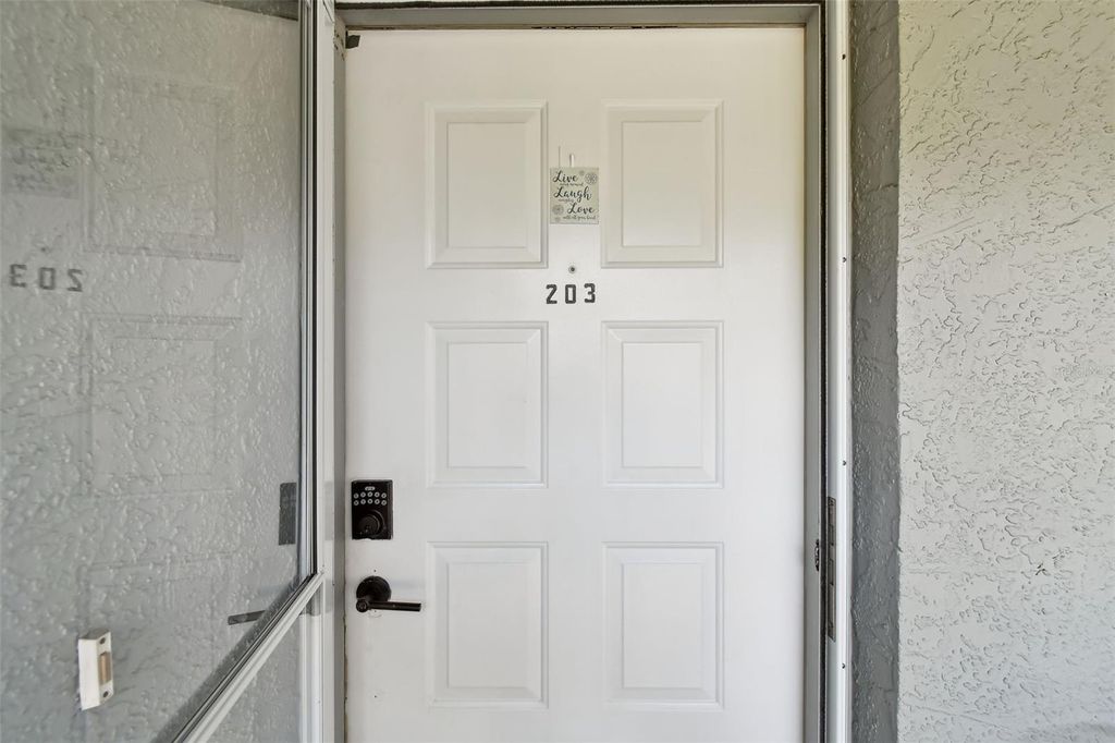 Photo of 1420 Oak Hill Drive #203, Dunedin, FL 34698 (MLS # TB8409552)