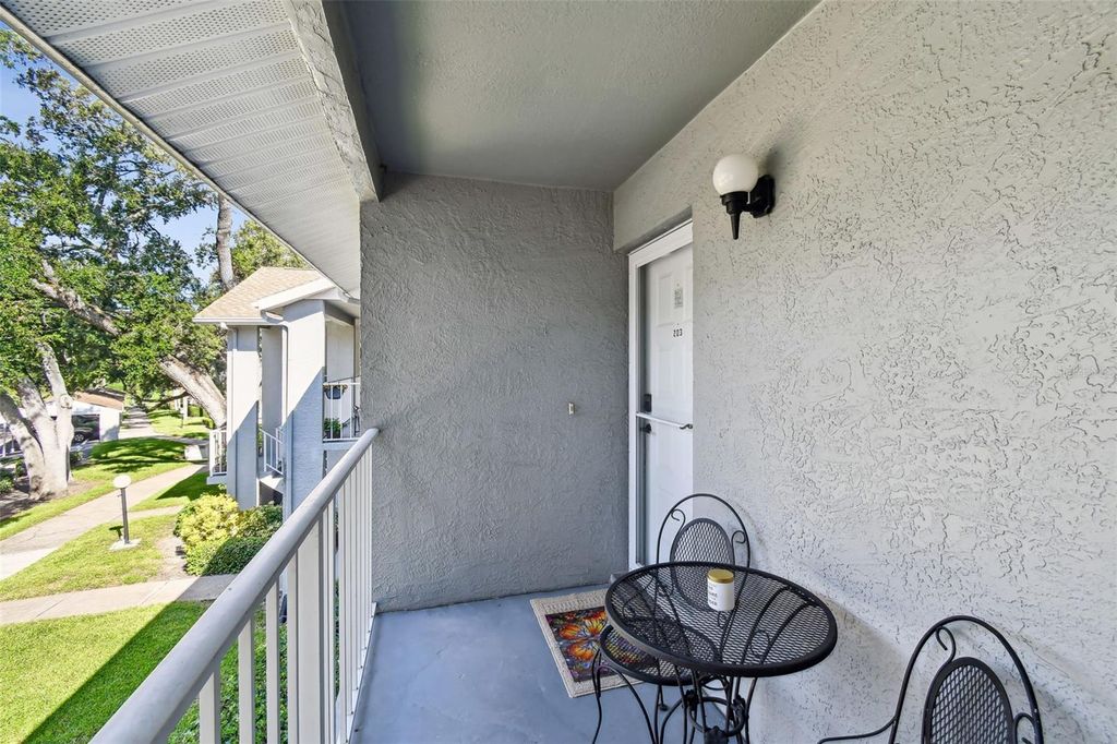 Photo of 1420 Oak Hill Drive #203, Dunedin, FL 34698 (MLS # TB8409552)