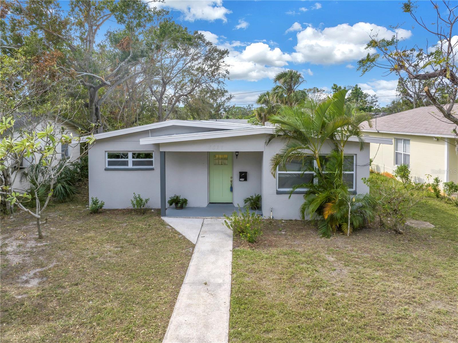 Welcome to 4027 7th Street South, a charming 3-bedroom, 1-bathroom single-family home in the heart of St. Petersburg, FL. This solid block residence offers 1,251 square feet of thoughtfully designed living space, perfect for those seeking affordable and comfortable living.
Step inside to discover an open and modern kitchen, featuring granite countertops, a flat surface range, microwave, dishwasher, and a 4-door refrigerator. The seamless wood-based laminate flooring throughout adds a touch of elegance and ease of maintenance.
This home is move-in ready, boasting a newer roof, 2022 HVAC system, and a 2022 electric water heater. Fresh interior paint and double-paned windows enhance energy efficiency and aesthetic appeal. The inside laundry room adds convenience to your daily routine.
The family room, with its sliding glass doors, opens to a quaint back courtyard/patio, providing additional space for entertaining and access to the covered carport.
Located just a few blocks from the Grand View Boat Ramp, this property offers easy access to outdoor activities. Enjoy a short walk to local restaurants, or explore the nearby Boyd Hill Nature Preserve and St. Petersburg Country Club. Situated in an X flood zone, this home provides peace of mind while being conveniently close to Downtown St. Pete's vibrant eateries and entertainment options, USF/Stetson, I-275, and the area's renowned beaches and shopping.
Don't miss your chance to own a piece of St. Petersburg's charm. Contact us today to schedule a viewing and make this home yours.