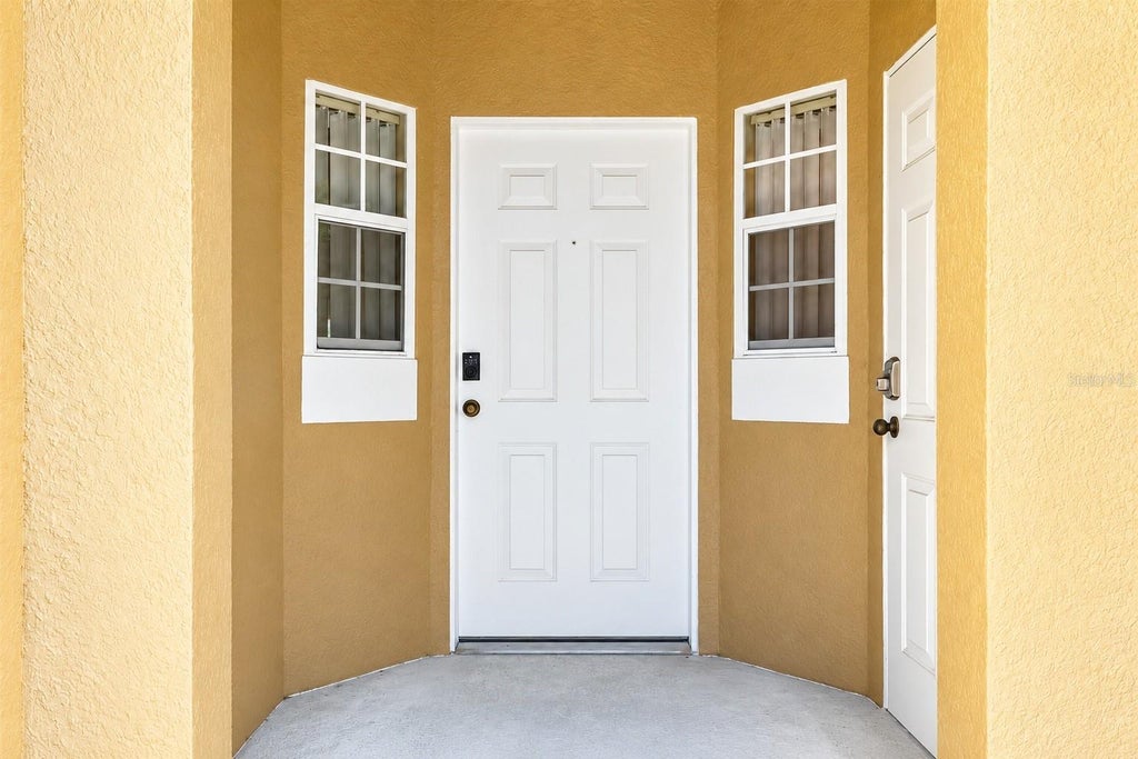 Photo of 8516 Crystal Cove Loop, Kissimmee, FL 34747 (MLS # O6447766)