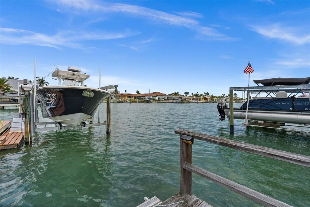 Photo of 710 116th Avenue, Treasure Island, FL 33706 (MLS # TB8508928)