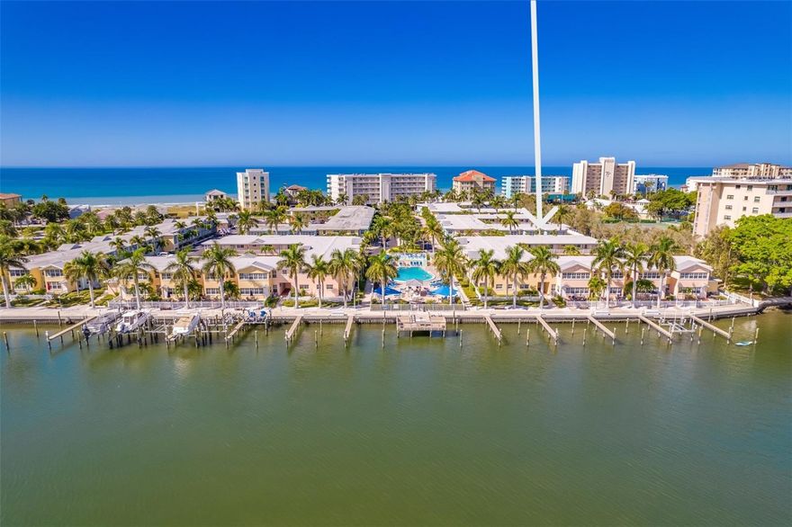 SECOND FLOOR CONDO...HIGH AND DRY...no damage from recent storms to this unit! PARADISE FOUND IN INDIAN SHORES...nestled between the Gulf of Mexico and the Intracoastal Waterway. FULLY FURNISHED TURNKEY BEACH CONDO with 1 Bedroom, 1 Bath and BONUS SUNROOM offering INCREDIBLE LIGHT and potential to SLEEP 6. This COASTAL INSPIRED unit is immaculately UPDATED AND TURNKEY. Open Floor Plan with ceramic tile floors, gleaming white crown molding, white wood cabinetry, closets galore, and coastal furnishings. Large bathroom with built-in linen storage, walk in fully tiled shower walls, and upgraded frameless glass shower doors. Living Room is centrally located between the dining and sunroom offering a dry bar and flatscreen TV. Sunroom is perfect for guests with a sleeper sofa or can be used as an OFFICE. FULLY EQUIPPED KITCHEN with granite counters, Keurig coffee maker, full-size appliances and brand NEW dishwasher. Cable & Internet are included in your HOA fee. Barefoot Beach offers everything you could dream and more just steps from your front door. A true WATERFRONT OASIS with LUSH LANDSCAPE featuring HEATED POOL, SUN DECK, new community FISHING DOCK, BBQ Grills, outdoor dining areas, multiple laundry facilities in every building on every floor, bike storage, club room, and PRIVATE BOAT SLIPS are subject to availability for rent or purchase AND the BEST Part...PRIVATE DEEDED BEACH ACCESS with a signaled cross on demand. NO RENTAL PERIOD RESTRICTIONS. An ideal INVESTMENT PROPERTY, SECOND HOME or PRIMARY RESIDENCE. This complex does not require or limit the days an owner can use their unit. For your convenience, there is an on-site property management company should you choose to use them, or you can choose another rental company or rent the unit yourself. Barefoot Beach is located on 5 ACRES along 400 FEET of INTRACOASTAL WATERWAY. Located in the QUAINT BEACH TOWN of INDIAN SHORES on the Gulf of Mexico with nearby dining, shopping, miniature golf, and WHITE SUGAR SAND BEACH. Just steps from your front door is the SUNCOAST BEACH TROLLEY that will take you up and down the Pinellas Beach Coast. Close to John's Pass, Downtown St. Pete with restaurants, night life, museums and famous pier. Two International Airports to serve you. TIA is 45 minutes and PIE is 25 minutes. The unit has future bookings that must be honored by the new owner. Good Rental Income and is perfect for a 1031 Exchange. Floorplan photo #38.