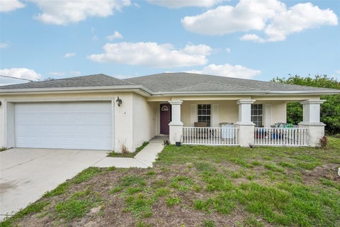 Photo of 2614 61st Street W, Lehigh Acres, FL 33971 (MLS # O6406088)