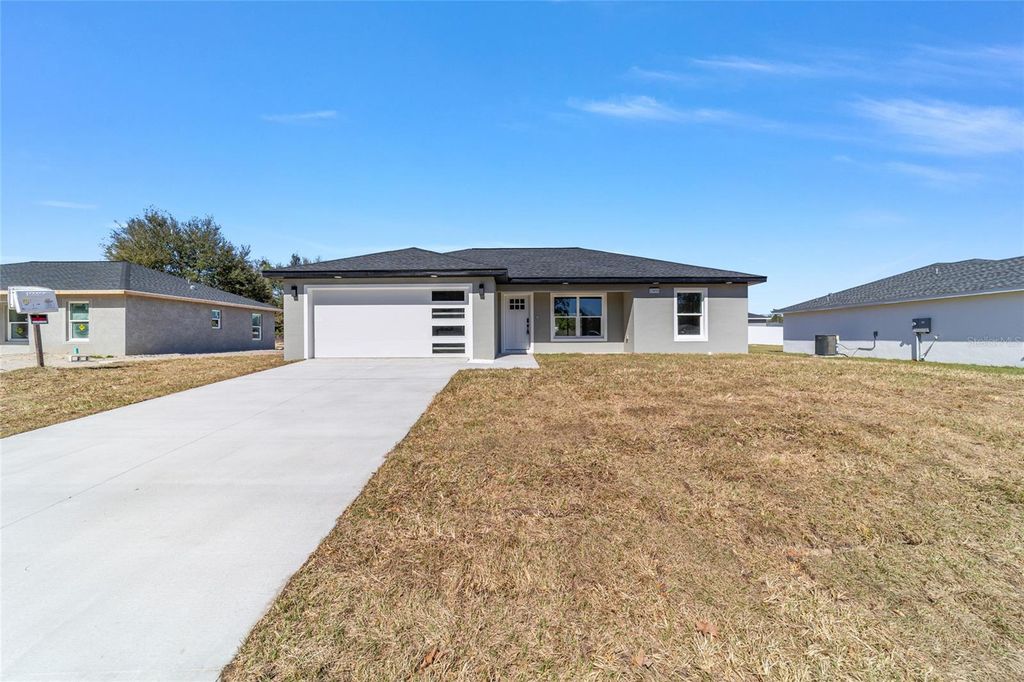 Photo of 13869 SW 101 Street, Dunnellon, FL 34432 (MLS # OM723044)