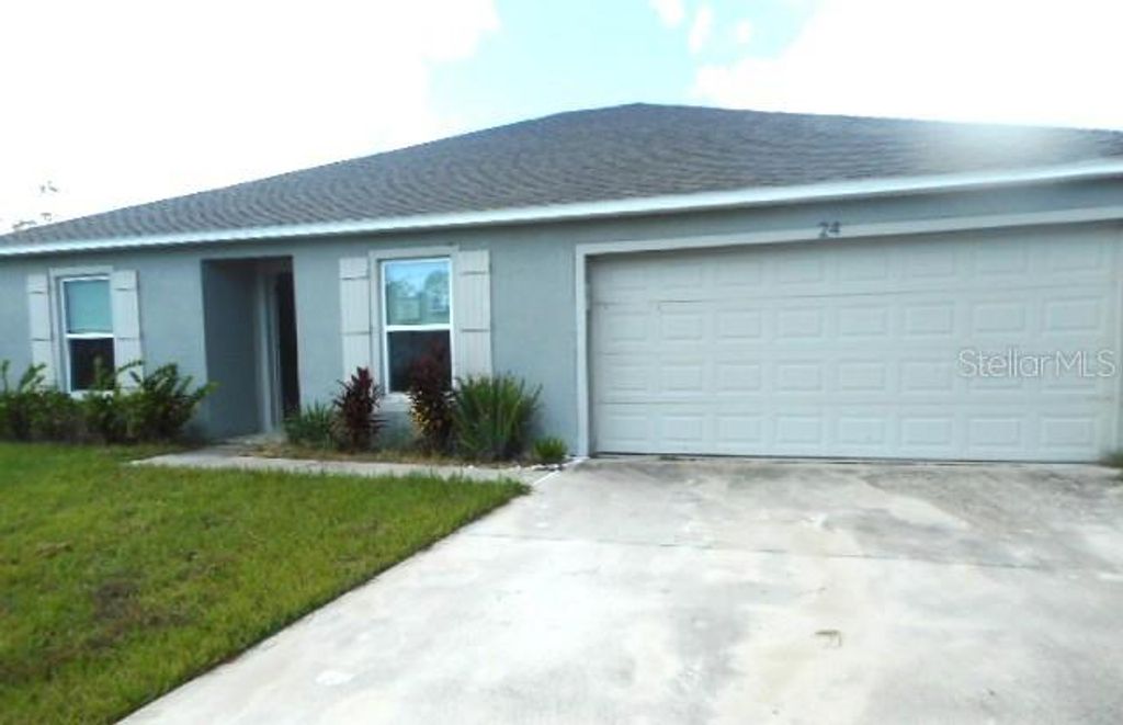 Photo of 24 Rockingham Lane, Palm Coast, FL 32164 (MLS # V4945712)