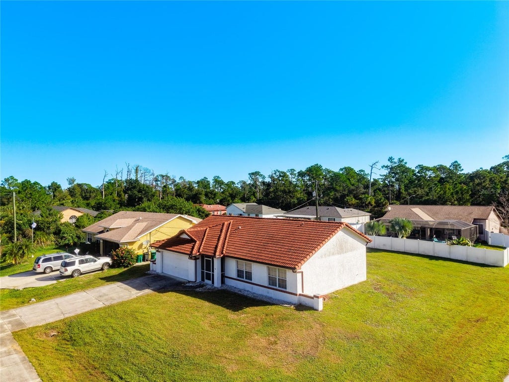 Photo of 3060 Collingswood Boulevard, Port Charlotte, FL 33948 (MLS # TB8563100)