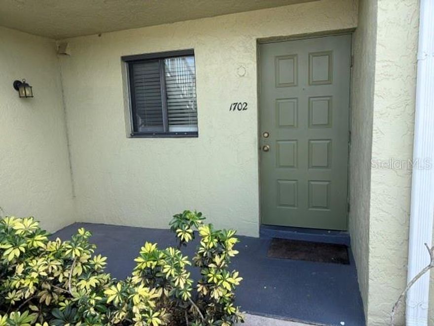 Beautiful First Floor Condo with low HOA's only $800 a quarter and in a X flood zone meaning no flood insurance is needed. This upgraded Condo has Wood cabinets, Granite counters, tile thru out along with totally updated bathrooms with wood cabinets and Granite counters. The appliances were all replaced in 2023, New hot water heater in 2024 and brand new Air condition unit in 2025. It also has a new washer and dryer that have never been used. this open floor plan leads you to your screened Lanai that sits on a 16 acre lake that is perfect for relaxing or have in candlelight dinner. COMBO FOR LOCK BOX IS IN SHOWING TIME