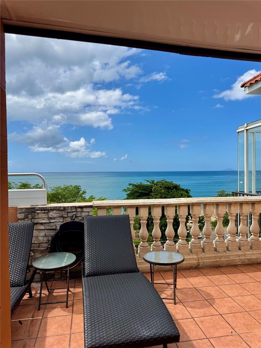 Corner apartment is a 3 level penthouse  with ocean view from several rooms. First level of apartment is on level 4, and includes 2 bedrooms,1 full bathroom with jaccuzzi, and shower, 1/2 bathroom, kitchen, laundry, living room, dining area. Second level of apartment is on level 5, and it includes 3 bedrooms, 2 full bathrooms, living room, and dining or additional seating area.  Third level of apartment is a gorgeous terrace with amazing ocean view; also in third floor terrace is   one bedroom, kitchen and full bathroom. Apartment has a bullet elevator, and a spiral staircase. Condo is across  the street from "Balneario", approximately 80 linear meters from the water.   Approximately 650 linear meters from downtown square.  5 parking spaces. HOA $663.01.