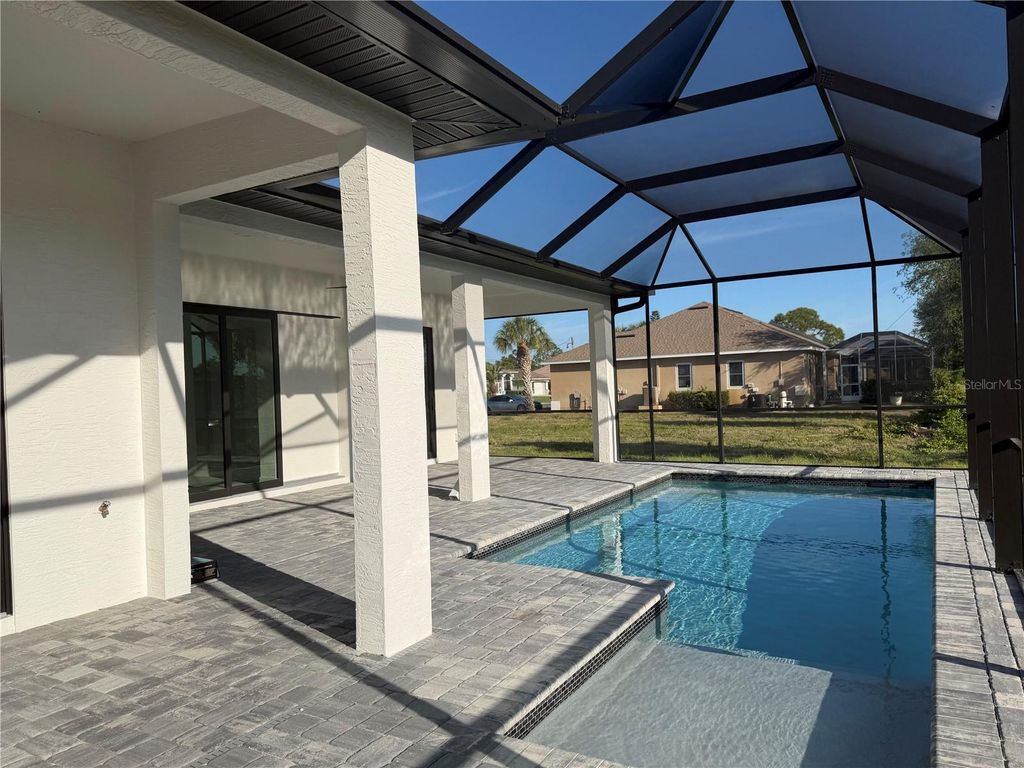 Photo of 72 Tee View Road, Rotonda West, FL 33947 (MLS # C7525196)