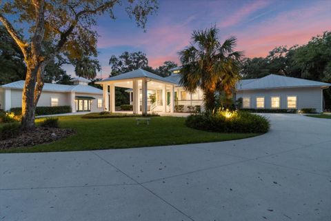 Photo of 20 Captains Cove Road, Inglis, FL 34449 (MLS # OM685603)