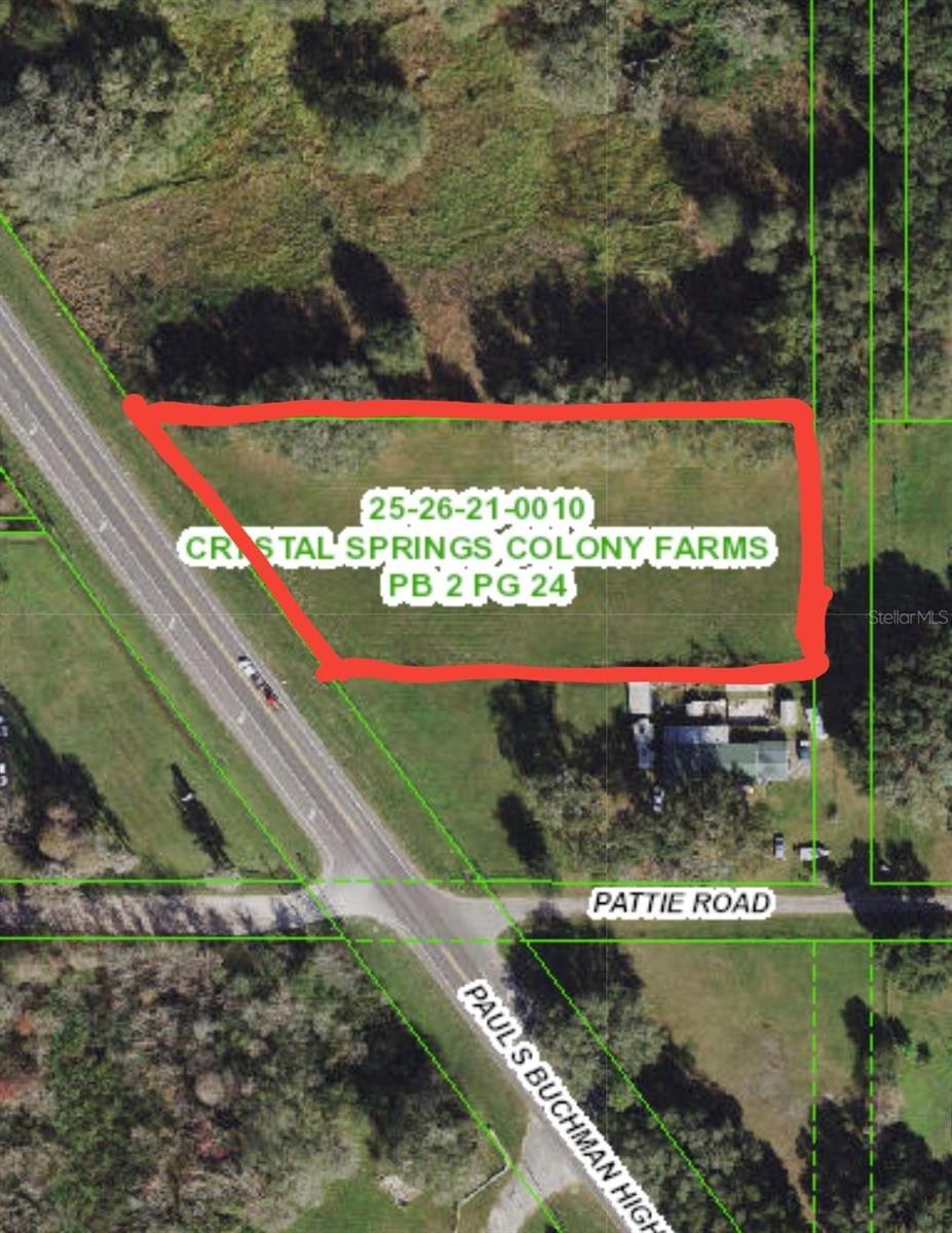 Fully fenced, well maintained cleared lot located on Paul Buchman Hwy. Multiple uses for this property and future development potential.