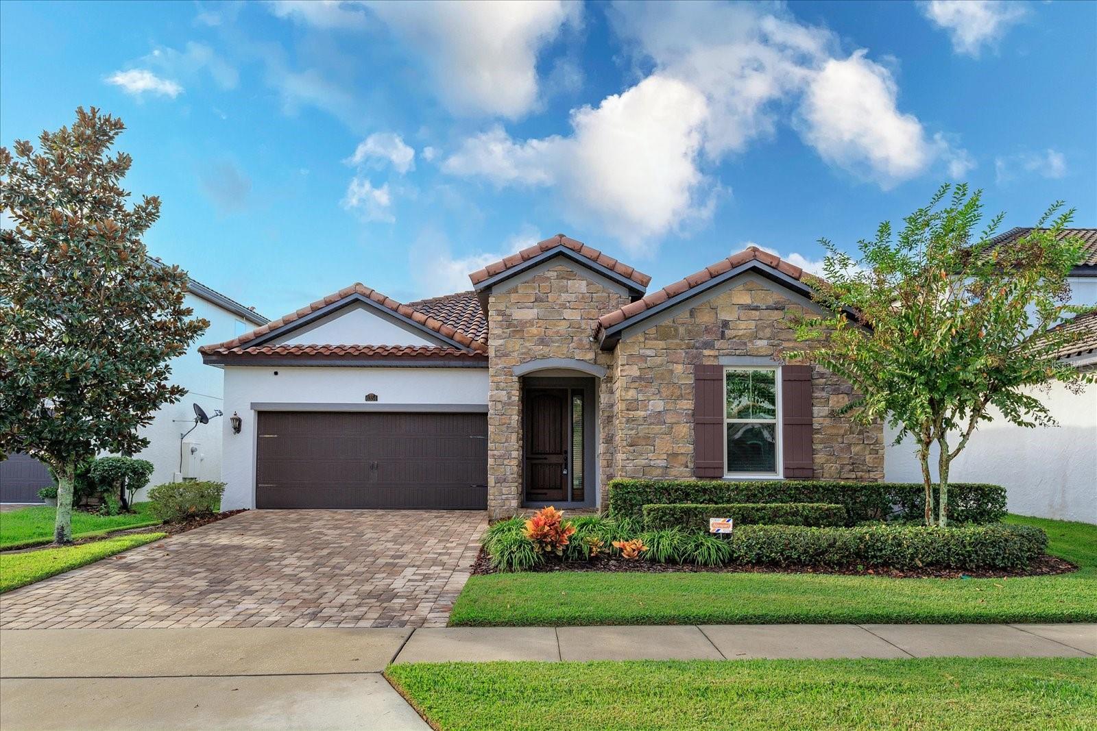 Coming soon. August 1st ready. Beautiful single-family Mediterranean home with 4 bedrooms and 2 bathrooms, and a 2 car garage in the desirable gated community of Enclave in Windermere. This home starts with a great curb appeal - meticulously landscaped front, paver driveway, and elegant tiled roof. The community is located within minutes of restaurants, shopping and entertainment. Tiled floors, 42" upper kitchen cabinets, washer, dryer, refrigerator.