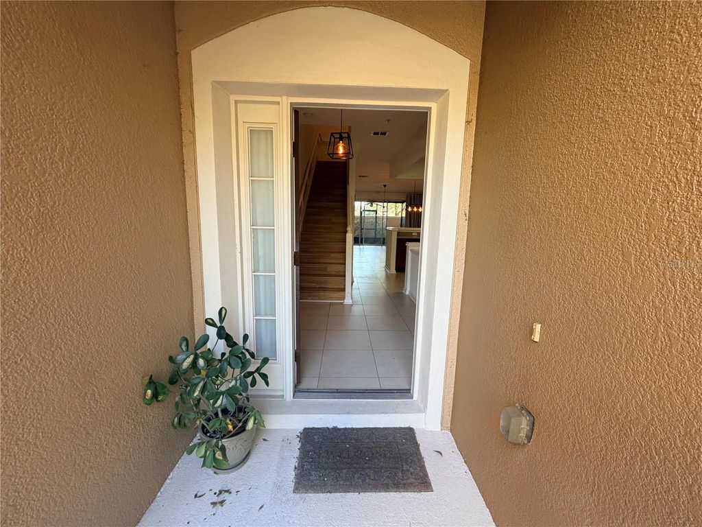 Photo of 2837 Villafuerte Point #105, Orlando, FL 32835 (MLS # O6365058)