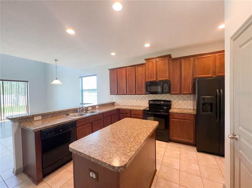 Photo of 4644 Doral Park Avenue, Kissimmee, FL 34758 (MLS # O6401784)