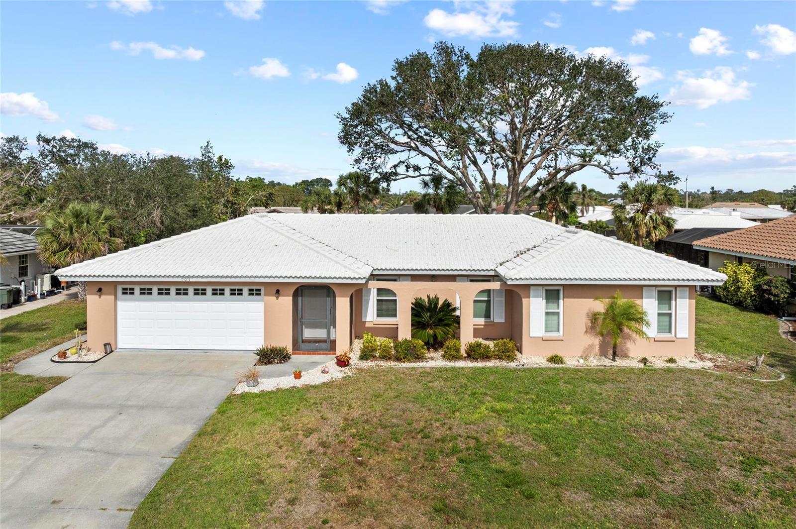 This beautifully remodeled pool home in Sorrento East is truly impressive! The full renovation brings a fresh and modern feel to the property, making it feel like a brand-new home. The fact that it has low HOA fees ($150 annually) and very little restrictions is a huge bonus for those seeking freedom and flexibility in their living situation. This home has 3 bedrooms, PLUS DEN or OFFICE, 2.5 baths. Featuring spacious guest rooms and a beautifully appointed primary suite featuring a large walk-in closet and custom-tiled walk-in shower, and multiple head shower system. BRAND NEW kitchen with white shaker-style cabinets, granite countertops, new appliances, and modern fixtures. WOOD LIKE TILE flooring and custom tile throughout the home for a sleek, cohesive look. Newly designed office/den with French doors, perfect for additional living space or work-from-home needs. Outdoor living includes a private covered lanai and swimming pool, ideal for relaxation or entertaining. Oversized backyard can easily be fenced for even more privacy. Modern updates such as a NEW HVAC system, NEW WATER HEATER, NEW PLUMBING, NEW IRRIGATION system, NEW IMPACT WINDOWS AND DOORS, NEW WASHER AND DRYER, and a roof that was cleaned and sealed in 2024. NEW GUTTERS, NEW AC DUCTWORK, POOL DECK CHEMICALLY TREATED, PAINTED & RESEALED, DRIVEWAY REPAINTED & FRONT LAWN RESODDED! This home is not only gorgeous but also move-in ready, life is like a vacation in this neighborhood!
