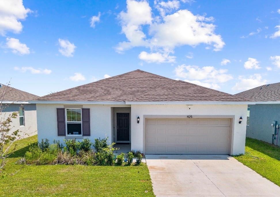 Photo of 425 Silver Palm Drive, Haines City, FL 33844 (MLS # S5146625)