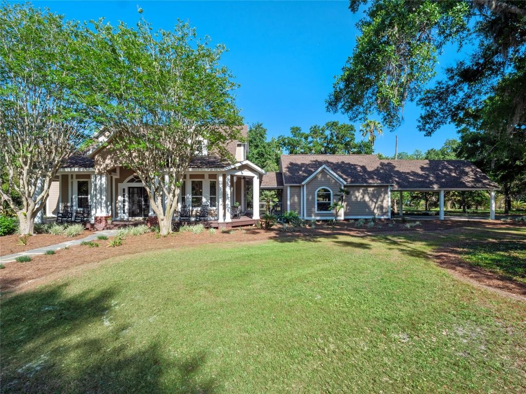 Photo of 6037 Lake Erie Road, Groveland, FL 34736 (MLS # O6374699)