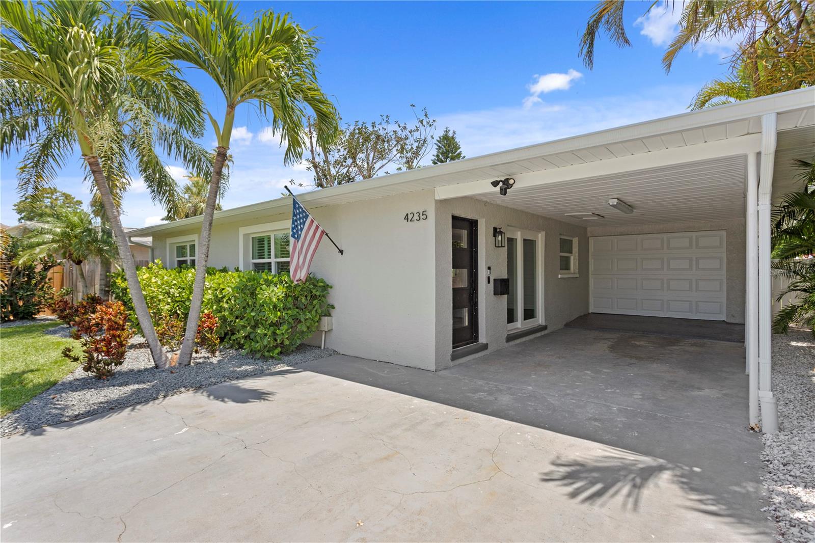 Coastal charm meets modern comfort in this newly renovated rental home! This beautifully remodeled coastal bungalow offers the rare opportunity to live in a stylish, updated home in a desirable waterfront community, without the responsibilities of ownership. The house has recently undergone complete professional updates, including brand-new cabinets, drywall, doors, trim, appliances, and more.
Every detail has been thoughtfully updated to provide a fresh, modern living experience.
Inside, you'll find an open-concept layout with elegant upgrades, including wood-look ceramic tile
flooring, electric window shades and plantation shutters. The house also includes
several Smart Home features, including a WiFi enabled thermostat, Ring camera
system, and Smart garage door opener. The spacious kitchen is a dream for
entertainers, featuring expansive black quartz waterfall countertops with two generous
bar overhangs. A newly added enclosed sunroom, complete with acrylic windows and a
mini-split air conditioning system, provides a perfect tropical retreat during the summer months.
The split floor plan ensures privacy, with an oversized owner’s suite on one side and
two well-appointed guest/office suites on the other. The primary suite boasts a
luxurious, newly renovated bathroom with dual sinks, a stunning glass-enclosed rainfall
shower, and two separate closets. The additional bedrooms are spacious and conveniently
located near the updated guest bath, which showcases custom tilework and
contemporary finishes. With access to Frontier Fiber Optic high-speed internet, this home is ideal
for remote work.
The fully fenced lush backyard is perfect for pets and outdoor enjoyment, with lawn maintenance included at no additional charge. The single-car garage and additional carport provide ample parking and storage, including Samsung front-load washer and dryer in the garage.
Nestled in the heart of Shore Acres, this home is close to fantastic local amenities, including the recently built Shore Acres Rec Center, the brand-new Speer YMCA Gym, and the newly opened Whole Foods. The beloved Islander Market—your neighborhood “bodega”—is just a short walk away. Best of all, this incredible luxe property is less than 5 miles from Downtown St. Pete.
This gorgeous home will not be available for long. Inquire now for a private showing!