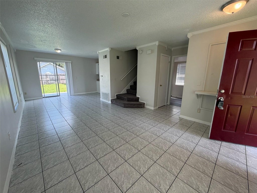Photo of 1965 Garwood Drive, Orlando, FL 32822 (MLS # O6449610)