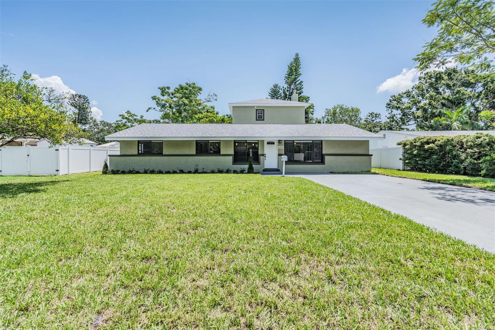 One or more photo(s) has been virtually staged. Welcome to this stunning, five-bedroom/three-bathroom, 2-story home situated in the heart of North St. Pete in the desirable Meadowlawn neighborhood.
This property combines the charm of an established neighborhood with the peace of mind that comes from knowing that almost everything inside and out is brand new. This home, and no other homes on this block, experienced flood damage in last year's storms, so rest can be assured. 2400+ sq ft home is one of the largest in this great neighborhood, with a very active Meadowlawn community that sponsors numerous events including: Easter Egg Hunts, Food Trucks in the park, a community garden, and many other events and activities.
This multi-master bedroom home features luxury vinyl plank flooring throughout the common areas providing a sleek, cohesive look. Relax in the tremendously spacious living room with high ceilings, complete with a fireplace, the perfect space to unwind or entertain guests. The primary upstairs bedroom is spacious, featuring an ensuite bathroom with large shower, soaking bathtub, and huge his-and-her closets (hers is bigger) that include custom shelving. Additionally, there is another downstairs primary bedroom with ensuite bathroom on the first floor that may be accessed through the mudroom, if desired.
There is not much to worry about here considering the numerous upgrades, including: a full dimensional shingle roof, 1of 2 HVAC systems, updated supply lines and water heater! Additionally, exterior upgraded transformations include: fresh sod, landscaping, and a full irrigation system. The fenced-in backyard currently boasts not 1, but 2 sheds - 1 of which has electrical and air-conditioning for use as a comfortable workshop or “She-Shed!” The backyard is also ideal for pets, outdoor entertaining, or simply enjoying your private slice of Florida sunshine. Possible trailer or boat/RV parking is available along the north side of the home.
This property is centrally located with quick access to I-275 and is just minutes away from vibrant downtown St. Pete, Tampa, and some of Florida’s best Gulf beaches. Don't let a home this great, and in such a convenient location, slip through your fingers! Schedule your private showing today!